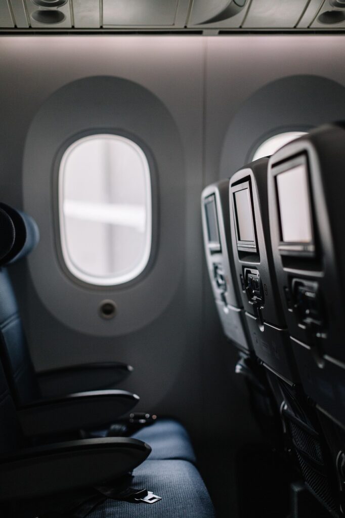 plane, seats, window, aviation, aircraft, commercial, travel, airport, air travel, boeing, adventure, phone wallpaper, aesthetic wallpaper, iphone wallpaper